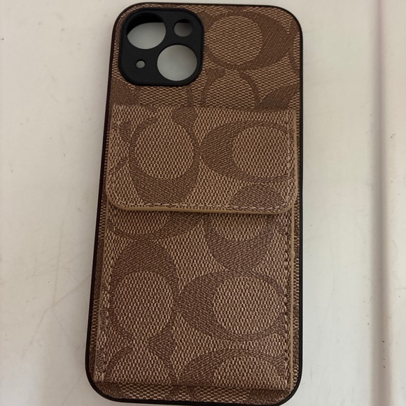 Coach Accessories - Coach IP14 Phone Case NWOT Coach Logo with pockrt